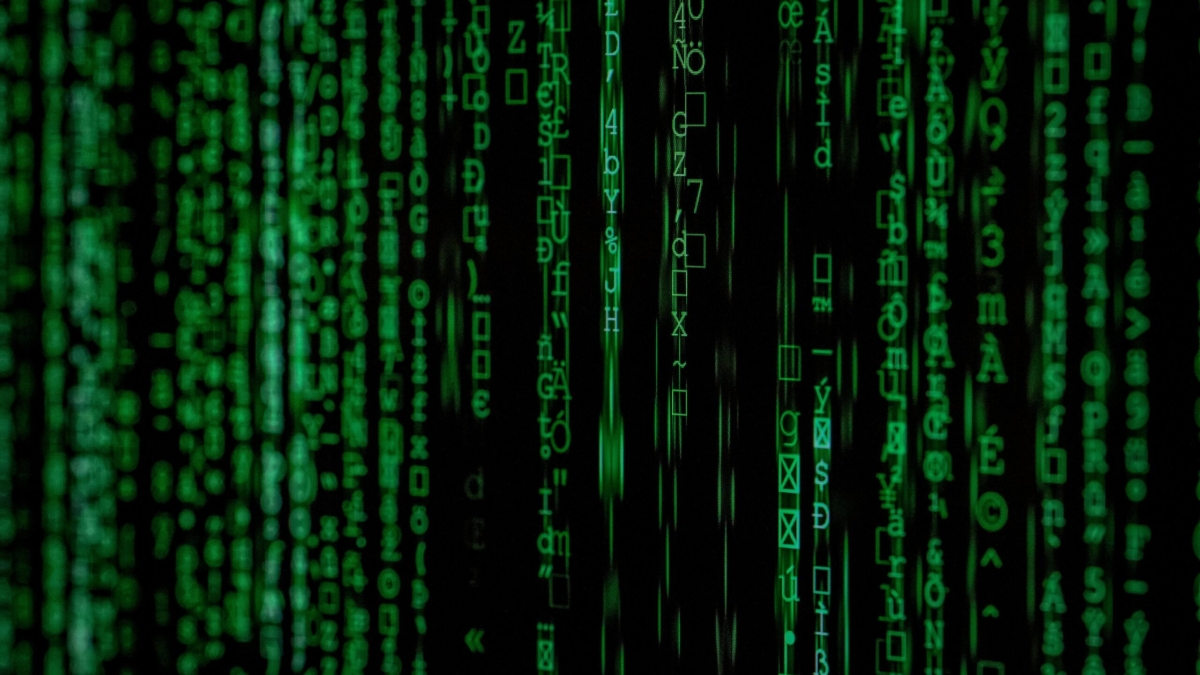 Abstract green matrix code background with binary style.